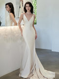 Trumpet Mermaid Backless V Neck Satin Wedding Dress