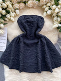 Enigmatic Black Cape Dress with Textured Fabric
