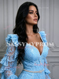 Side angle close-up showing the deep V sweetheart neckline, beaded belt details, and ruffled lace long sleeves on a light blue evening dress