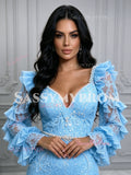 Close-up shot of the intricate lace appliques, sweetheart neck, and layered ruffle sleeves of the light blue prom dress