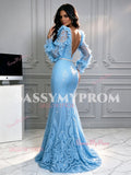 Back view of a backless light blue lace mermaid prom dress with long sleeves and a cascading lace train