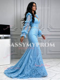 Full-length side profile of the fitted light blue lace trumpet gown showing the body-con silhouette and flare train