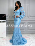 Light blue backless lace evening gown with statement long sleeves and trumpet mermaid silhouette for prom or gala