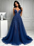 Navy blue V-neck backless prom dress with 3D floral appliqués and tulle ball gown skirt with front slit, full front view