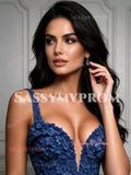 Close-up of 3D floral lace appliqué bodice and plunging V-neck on navy blue spaghetti strap prom dress