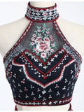 Embroidered halter crop top with floral neckband and multicolor flower pattern on dark fabric | PicSEO 1787445911617